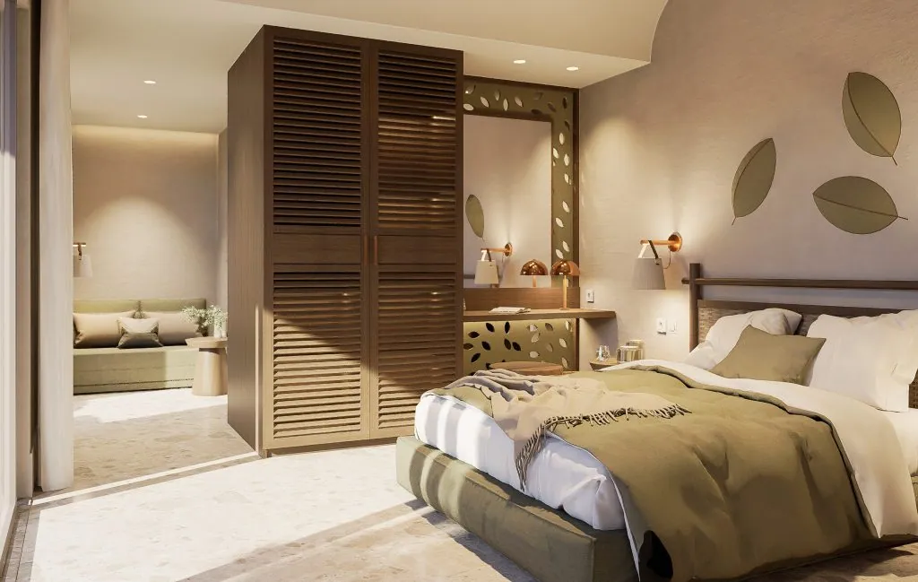 Double Deluxe room with a king-size bed and wooden wardrobe