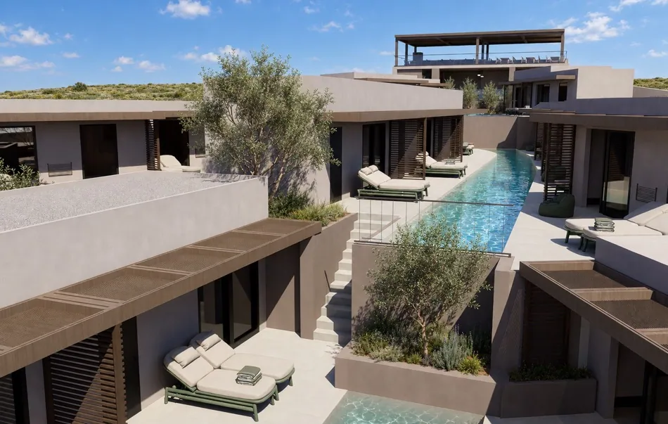 Room terraces with sun loungers stepping down to the shared pool